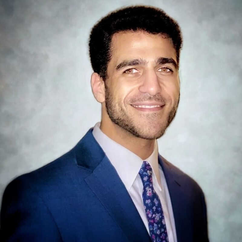 Headshot of Adam Khalifa.